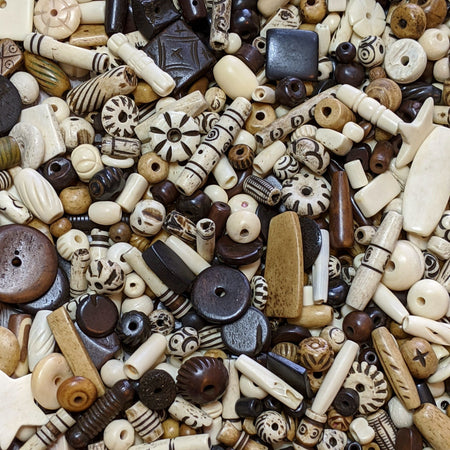 Assorted Colors, Sizes and Shapes of Buffalo Bone Beads by the Ounce